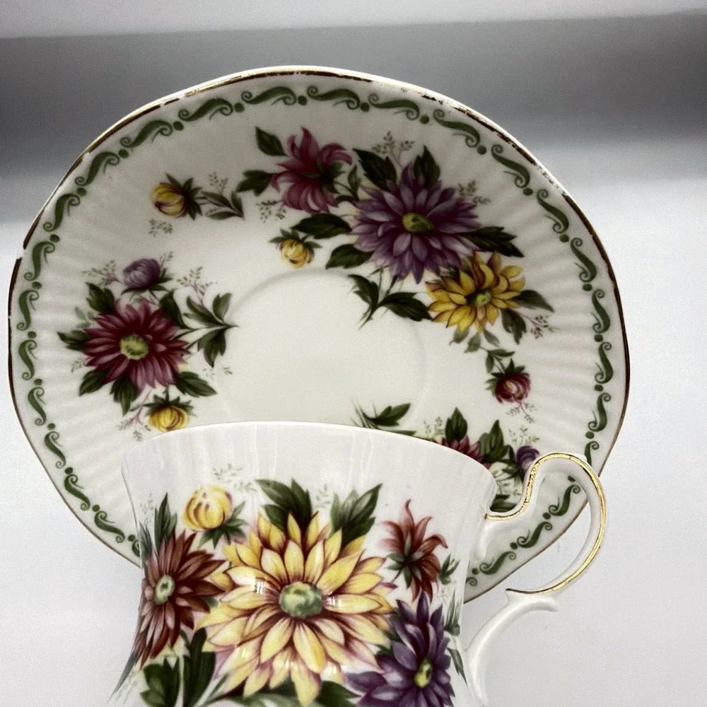 Vintage Queen's Rosina Wild Flowers fine bone china Tea cup with matching saucer